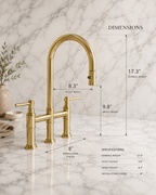 Gold bridge faucet with dimension callouts on a white marble background, showing overall height of 17.3 inches, spout height of 9.