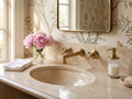 Bathroom vanity with sink, faucet, and decorative elements.