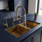 Gold kitchen sink and faucet set against a blue countertop
